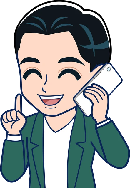 人差し指を立てて笑う若手の先生